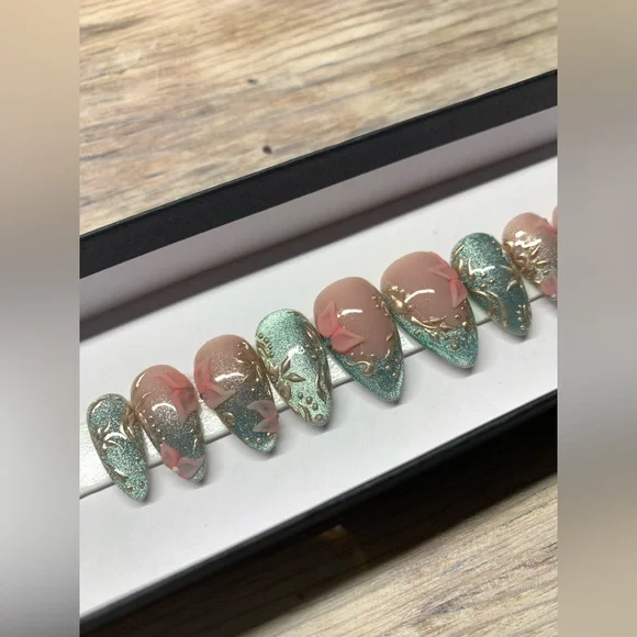 Elegant Almond Cat Eye Press-On Nails with Gold Chrome Filigree and Flowers